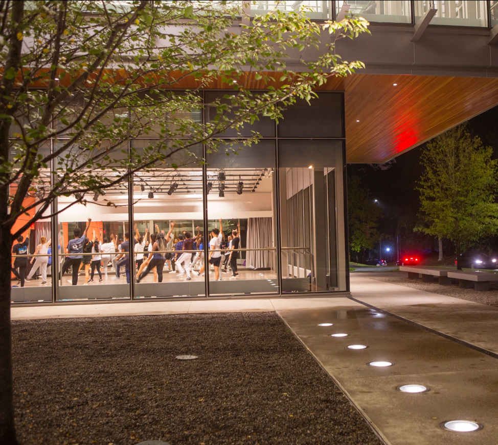 The lower level of the Rubenstein Arts Center at night.