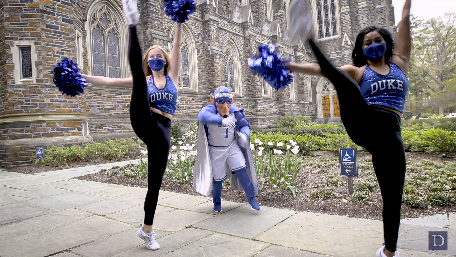 Dancing Devils seniors Hannah Folks and Alyssa Nicholas perform with the Blue Devil during our filming session.