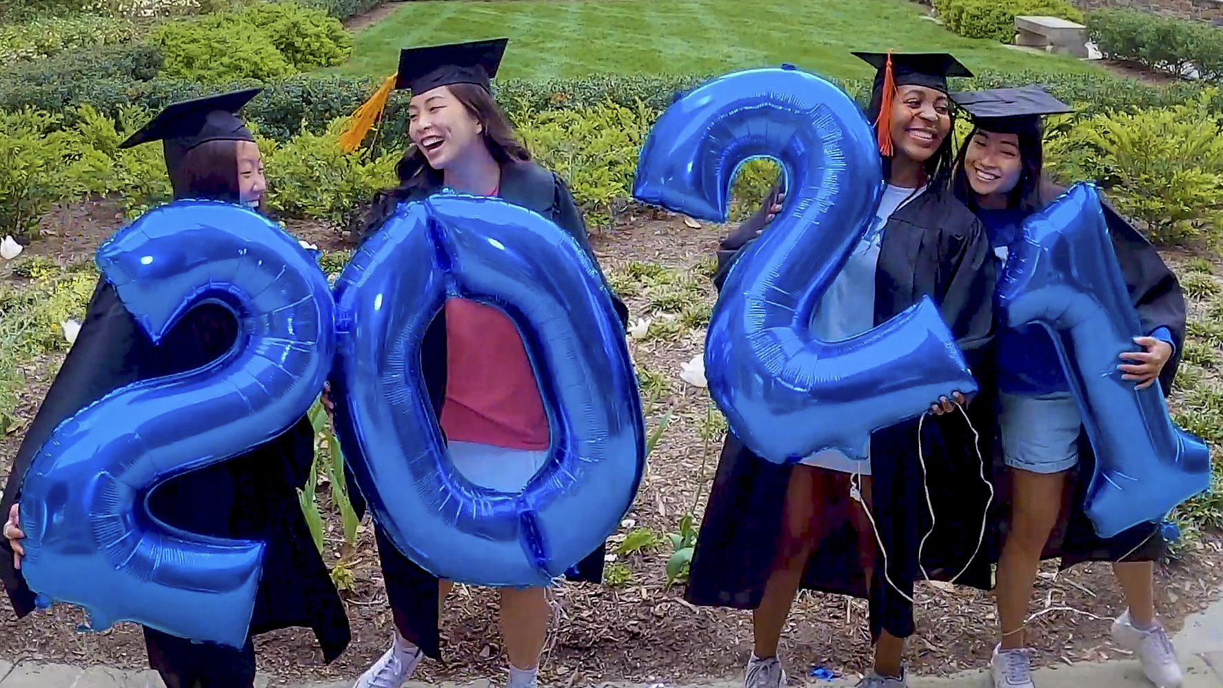 Seniors Lavonne Hoang, Alice Zheng, Genoveva Ntirugelgwa, and Sonia Lau celebrate with 2021 balloons during our filming session.